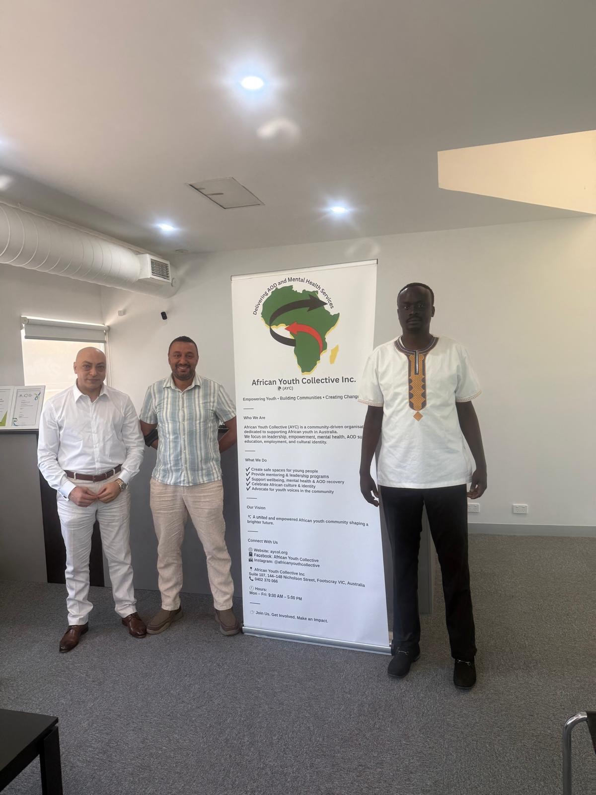 AYC Founder/CEO Mr Isaiah Alier Mashinkok Jr with representatives from a security company